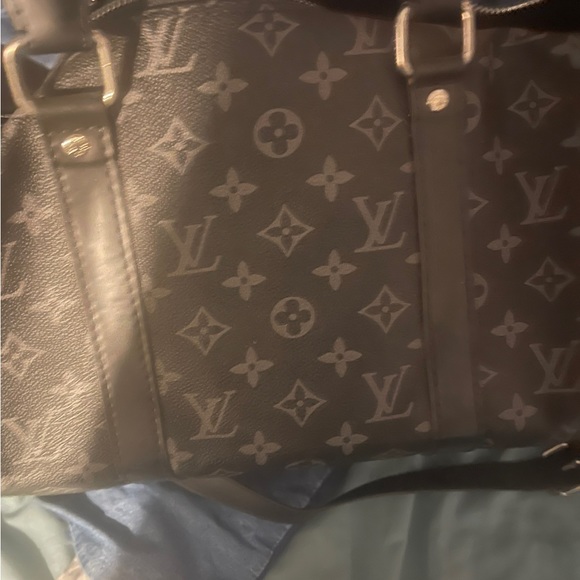 lv duffel bag for sale in really good condition comes with all the accessories - Picture 2 of 2